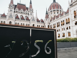 A memorial to the 1956 Hungarian Revolution with Hungarian Parliament Building