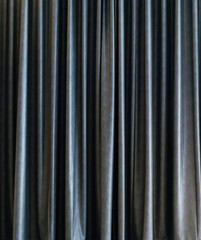 silver closed stage curtain with light effect