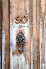 old wooden door with vintage rusty handle, Mdina, Malta