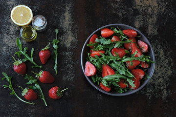 Healthy summer salad strawberry arugula. Dietary strawberry salad. Keto diet salad. Vegan food.