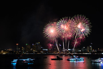 PATTAYA, THAILAND - MAY24: Beautiful lights on the night, colorful fireworks, and International fireworks at Pattaya International Fireworks Festival 2019 on May 24,2019 in Pattaya,Thailand.