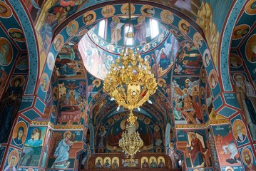 Fototapeta na wymiar orthodox church interior with golden chandelier