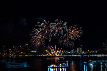 PATTAYA, THAILAND - MAY24: Beautiful lights on the night, colorful fireworks, and International fireworks at Pattaya International Fireworks Festival 2019 on May 24,2019 in Pattaya,Thailand.