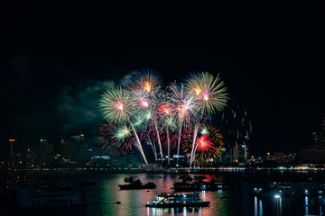 PATTAYA, THAILAND - MAY24: Beautiful lights on the night, colorful fireworks, and International...