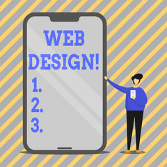 Writing note showing Web Design. Business concept for process of creating websites content production and graphic Man Presenting Huge Smartphone while Holding Another Mobile