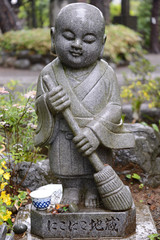 U in the sculpture of a Japanese monk