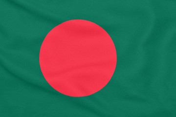 Textured fabric with flag of Bangladesh. Patriotic symbol