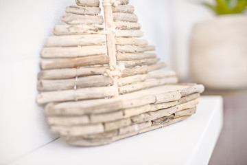 Wooden stick ship small close up on the blurred counter