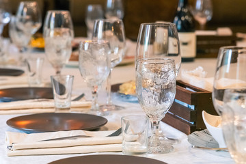 Tables in a cafe served for a holiday, birthday, wedding, banquet