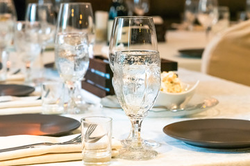 Tables in a cafe served for a holiday, birthday, wedding, banquet