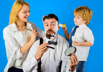 Barbershop. Barber shop tools. Hairdresser making hairstyle. Beard care. Hair preparation. Fashion. Bearded hipster in barbershop. Making beardstyle.