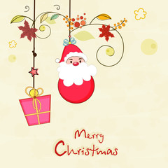 Fototapeta na wymiar Merry Christmas celebration poster with hanging santa and gift.