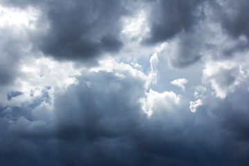 Fototapeta premium dark cloud with sun beam after hard storm