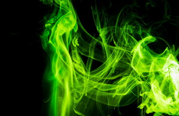 Green smoke on black background