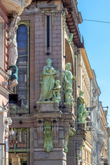 Wall and sculptures of Eliseevsky shop in St. Petersburg