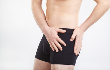 Hip pain. Fracture, blow, hip injury in a man