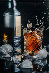 alcoholic whiskey drink in an ice glass
