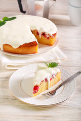 Cherry cake with cream topping