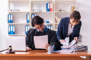 Two lawyers working in the office