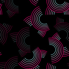 circular figures of pink and blue colors drawn on a dark background