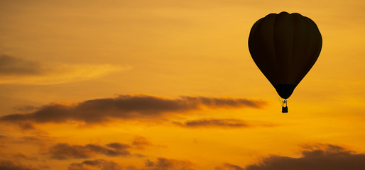 The silhouette of Balloon on sky at sunset