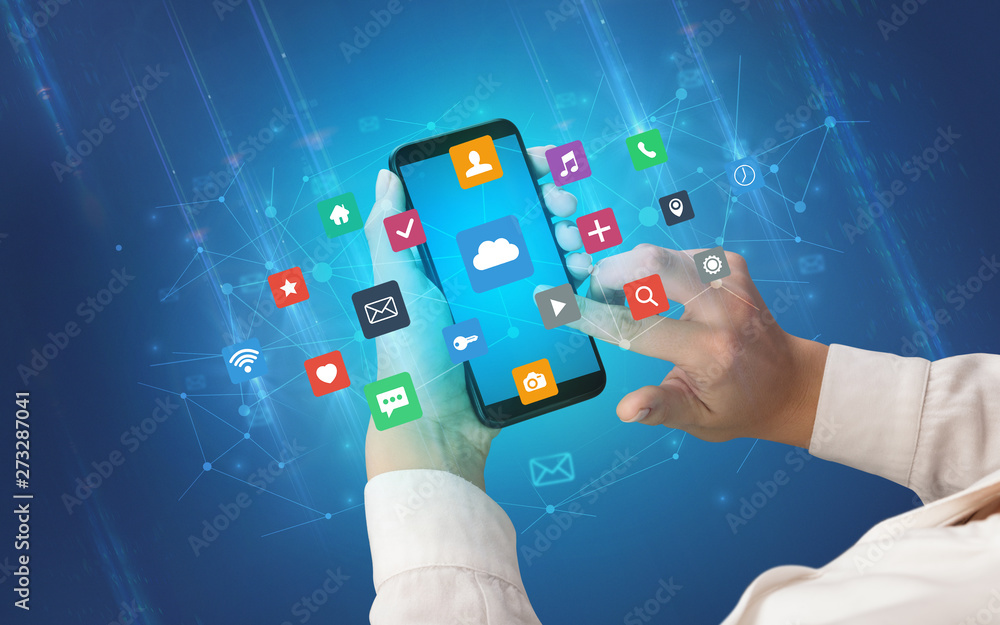 Aufkleber female hand using smartphone with colorful application icons around
