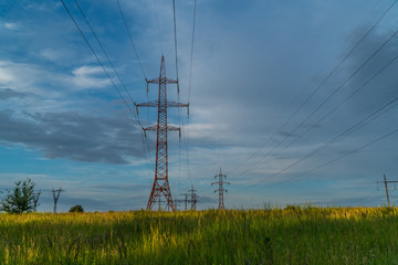 Electricity pylons and beautiful clouds