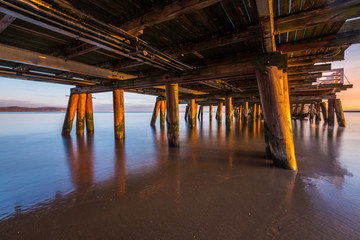 Wooden pier in Sopot seen from below on a summer morning. Poland