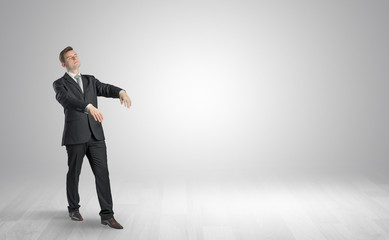 Fototapeta premium Zombi, sleepy maniac businessman walking in a copy space 