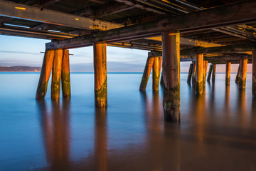 Wooden pier in Sopot seen from below on a summer morning. Poland