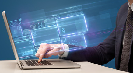 Fototapeta premium Hand typing on laptop with online accounting system concept 