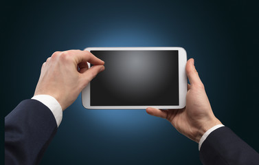 Hand using tablet with no concept and empty space
