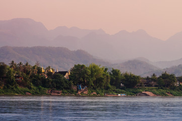 Mekhong or Mae Khong river view and old temple - Luang Prabang, Laos