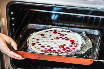 Cooking clafoutis. Cherry French Cake