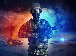 Fototapeta premium Armed soldier with sniper in the middle of a dust storm 