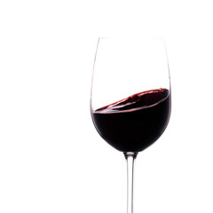 Rotwein wird im Glas geschwenkt