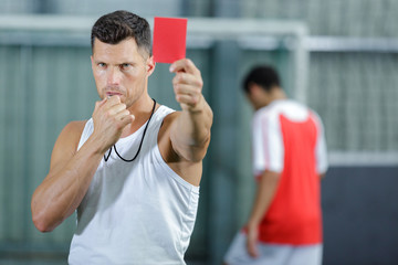 referee showing red card