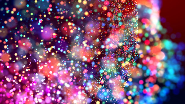 cloud of multicolored particles in the air like sparkles on a dark background with depth of field. beautiful bokeh light effects with colored particles. background for holiday presentations. 59