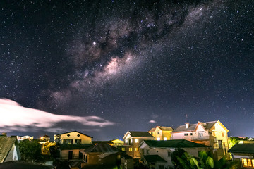 Milky way above rooftops of Southern Antananarivo, the capital of Madagascar.