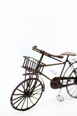 Fototapeta na wymiar Miniature bicycle on white background.