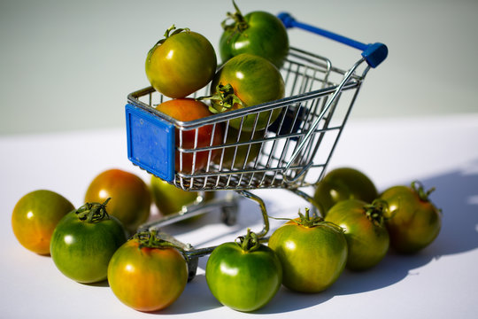 green camone tomatoes in shopping cart