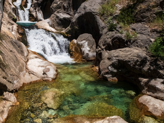 Cascade of waterfalls and natural pool at Sapadere Canyon, Alanya, Antalya, Turkey