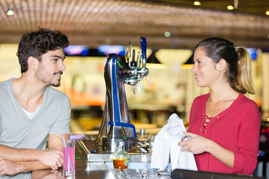man flirting with female bariste