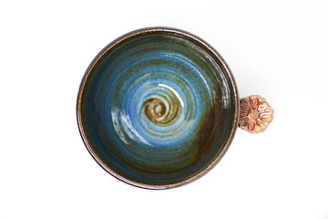 Teacup on white background.