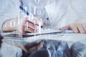 Writing man's hand with data icons.