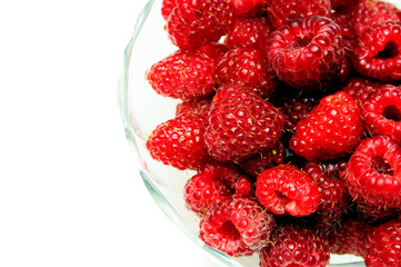 red raspberries in bowl, rasberry fruit with copy space 