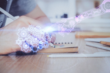 Writing human hands with tech theme multi exposure icons.