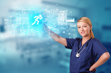 Doctor touching hologram screen displaying healthcare running symbols
