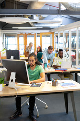 Business people working at desk in a modern office
