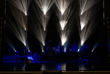 scene, stage light with colored spotlights and smoke